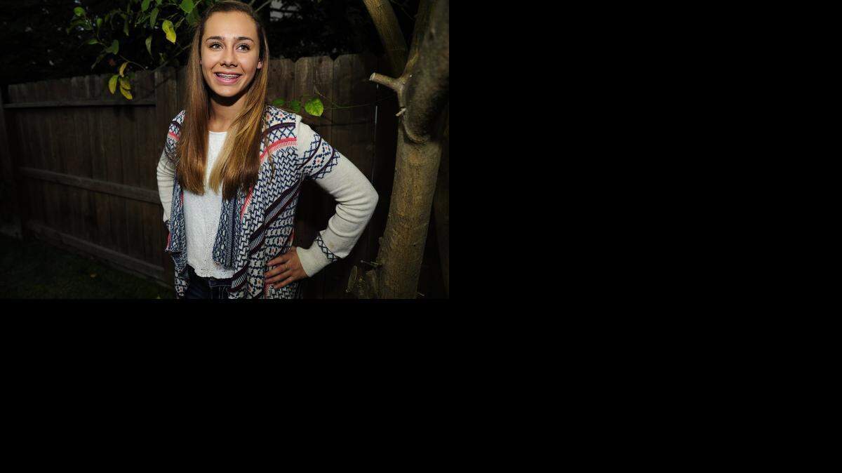 
Emma Baily, a freshman at Gregori High School, is pictured Friday at her Modesto home. Emma gathered 1,800-plus coats to give to children at schools in Ceres and Modesto.
