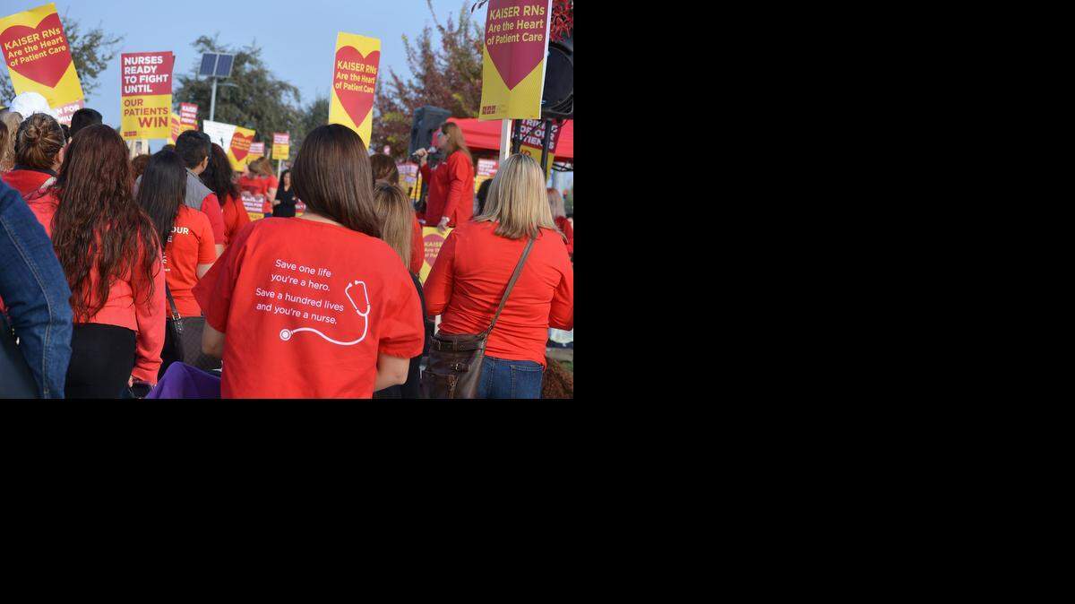 
Demonstrators gather outside  Kaiser Modesto Medical Center in November . Kaiser Permanente and its nurses agreed Saturday to a three-year pact affecting registered nurses and nurse practitioners.

