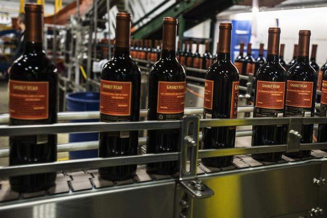 Gnarly Head zinfandel makes its way through the production line at Delicato Family Vineyards near Manteca.