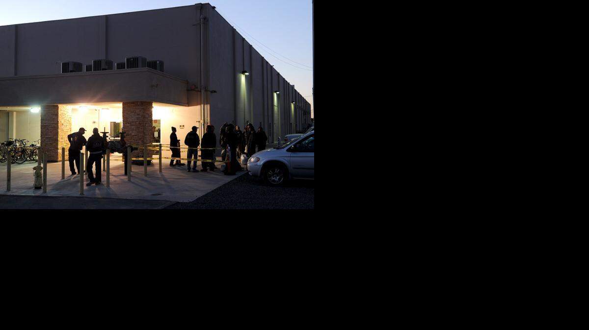 
Modesto area homeless people line up outside The Salvation Army’s Berberian Shelter at D and Ninth streets during the opening of its winter shelter in early November last year.
