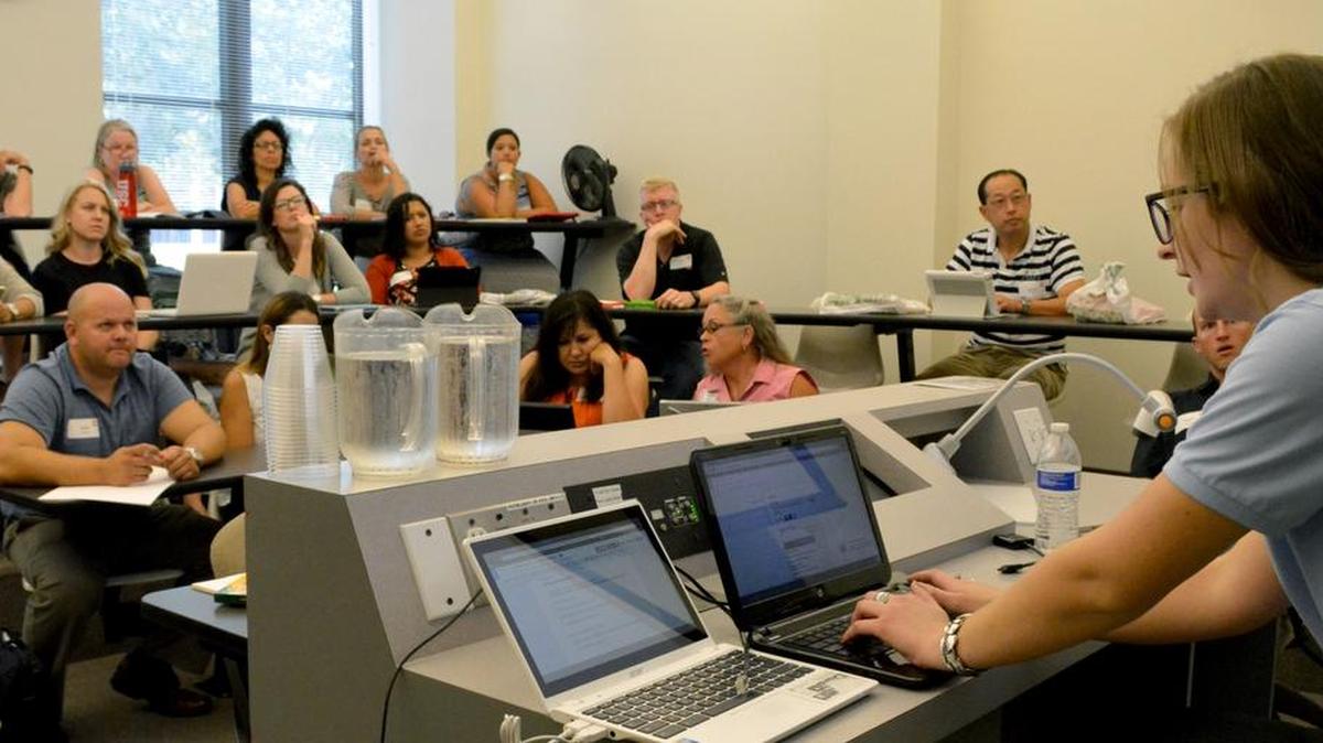
Callie Kitchen, an instructor at California State University, Stanislaus, leads a discussion of Google technology for teachers from around the region at the Better Together teachers summit on Friday. 
