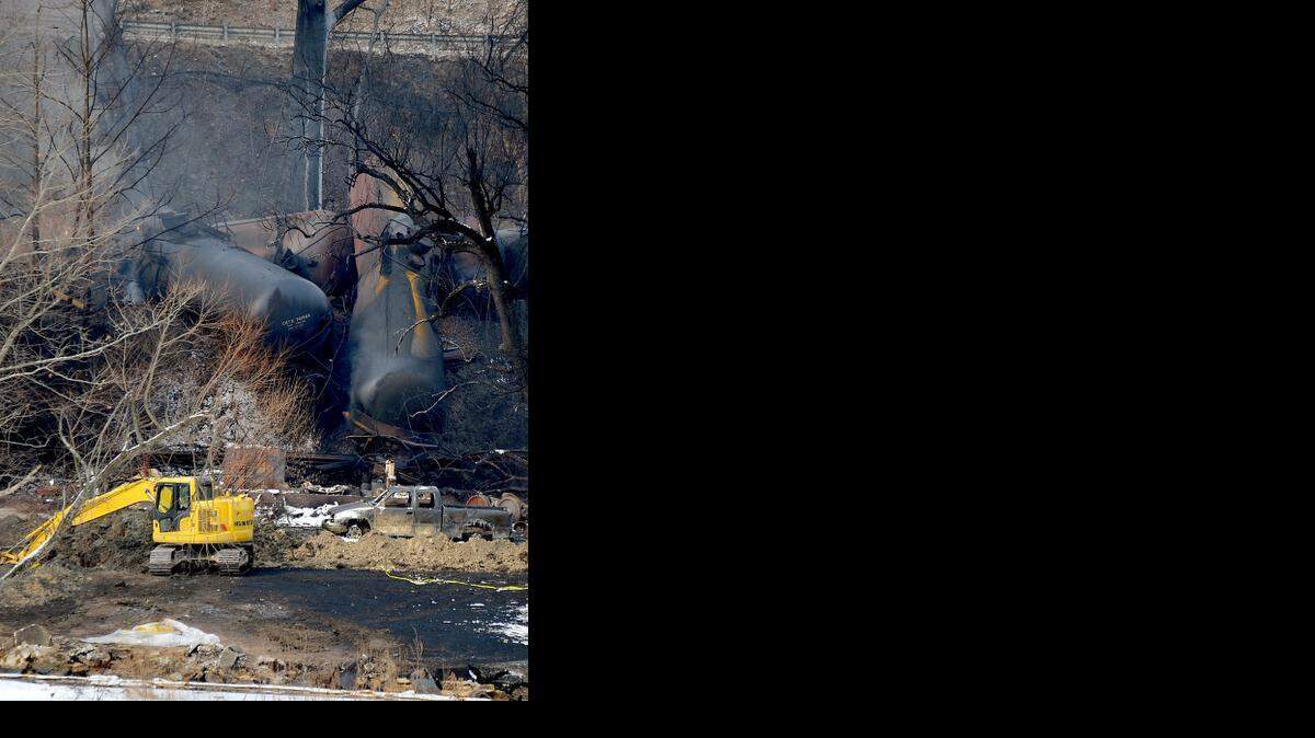 
On Feb. 18 near Mount Carbon, W.Va., heavy equipment is brought to the scene of a home that was burned down when a train derailment two days earlier sent a tanker with crude oil into the Kanawha River, shooting fireballs into the sky and leaking oil into a Kanawha River tributary. 
