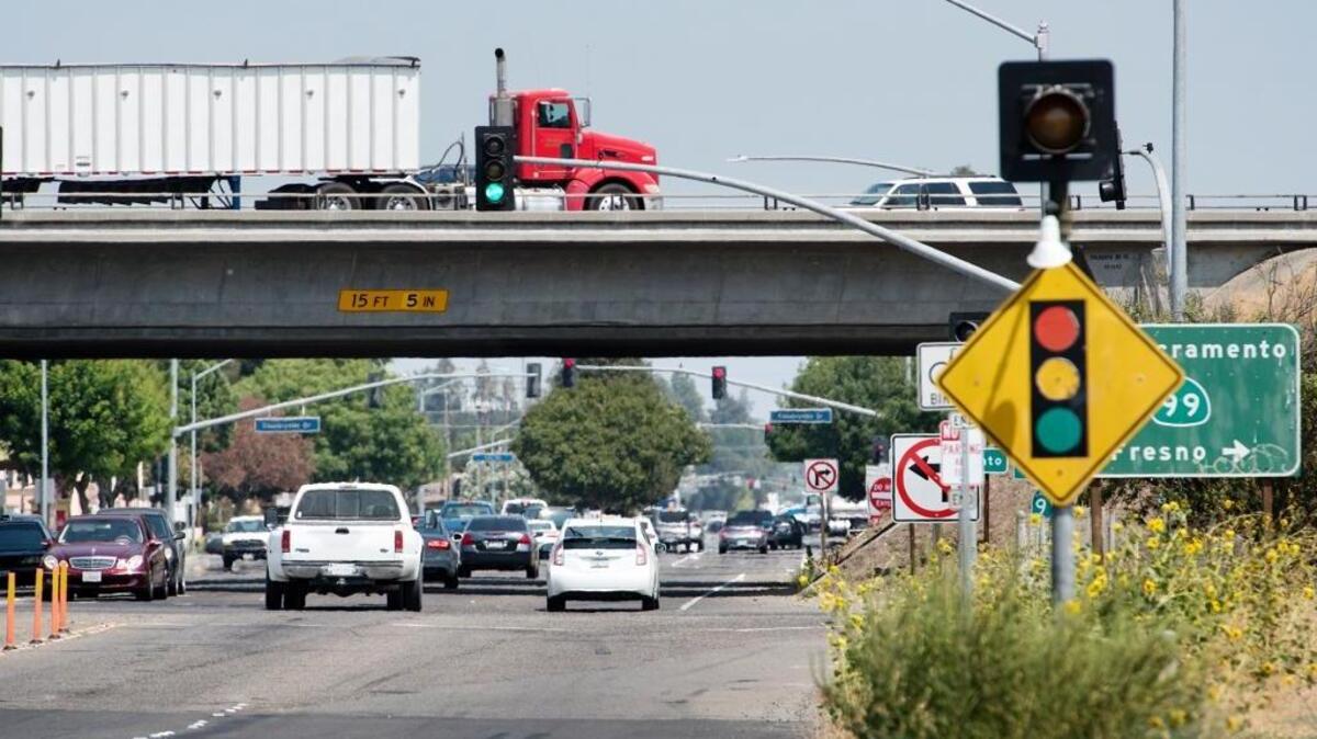 A report by the Auto Insurance Center says Turlock drivers average $31 per year in commute-related expenditures, the lowest cost in the nation, though the time spent waiting at red lights frustrates some Turlock drivers. Here, Highway 99 crosses over Fulkerth Road in Turlock on Wednesday, July 27, 2016.