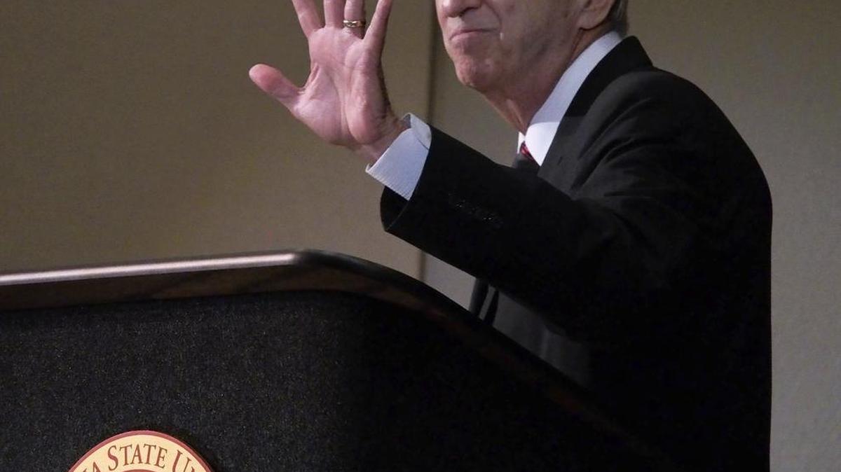 Stanislaus State President Joseph Sheley waves to the attendees after his annual speech to the campus community in August 2014.