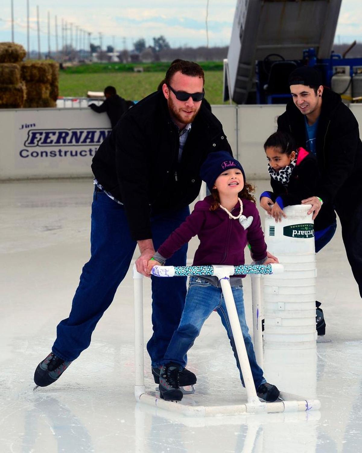 Brandon Walker skates with Aleeah Ecleo at Fields of Ice on RAM Farms in Turlock in January 2016.