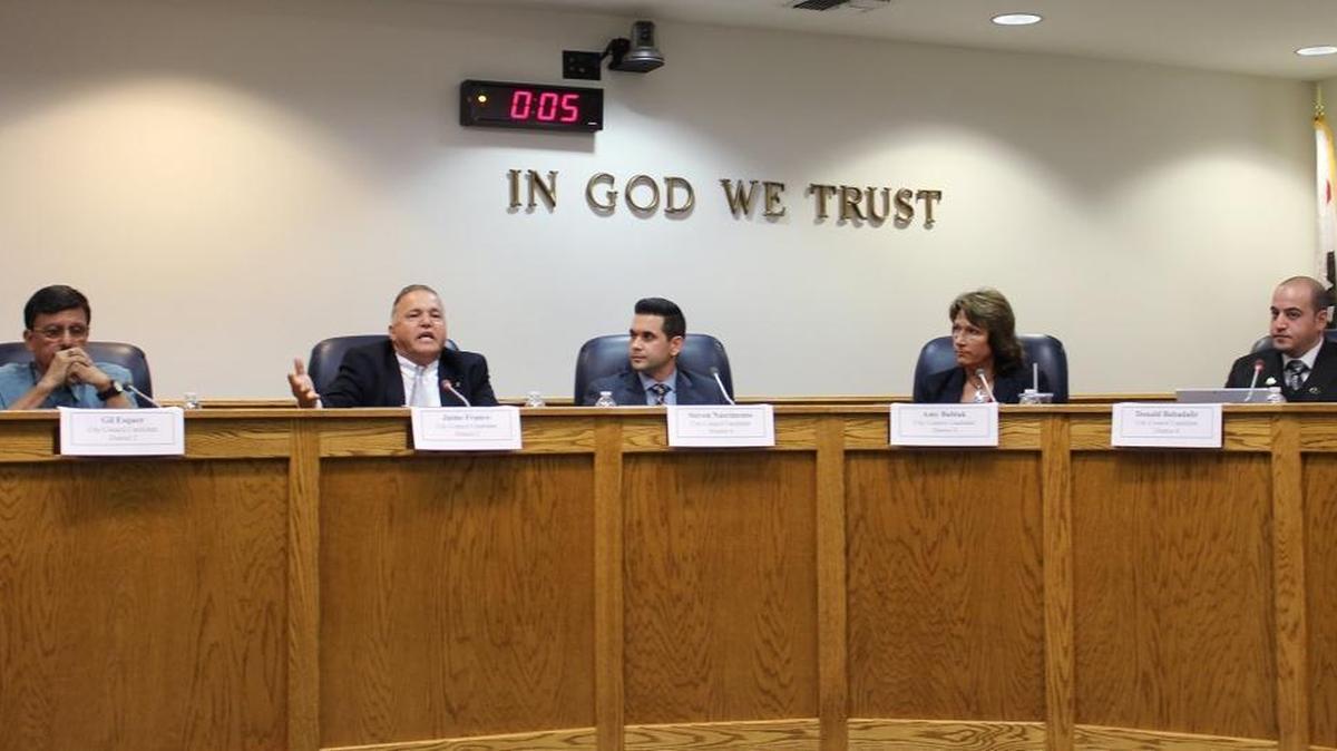 Candidates for Turlock City Council, from left, Gil Esquer and Jaime Franco, vying for District 2 seat, and for District 4, Steven Nascimento, Amy Bublak and Donald Babadalir, listen as Franco answers an audience question at a candidates forum held by the League of Women Voters on Oct. 5, 2016, in Turlock, CA.