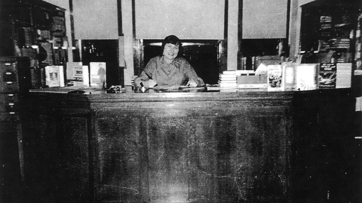 Librarian Myrt Cordon mans the desk around 1953 in this photo that appears with her memories in “A Century of Stories: Turlock’s Carnegie Remembered,” produced for the centennial of the library turned teen center turned arts center on North Broadway in Turlock, Calif.