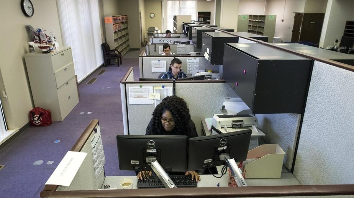 Court clerks scan documents in preparation for the reopening of the Stanislaus Superior Court branch in Turlock on Wednesday, Dec. 23, 2015.