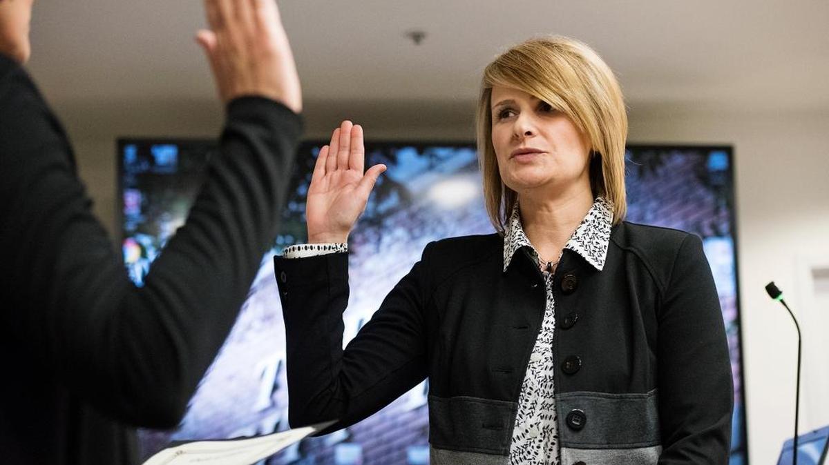 Turlock’s new city clerk, Jennifer Land, is sworn in by retiring Clerk Kellie Weaver during the City Council meeting in Turlock, Calif., on Tuesday, Dec. 13, 2016.