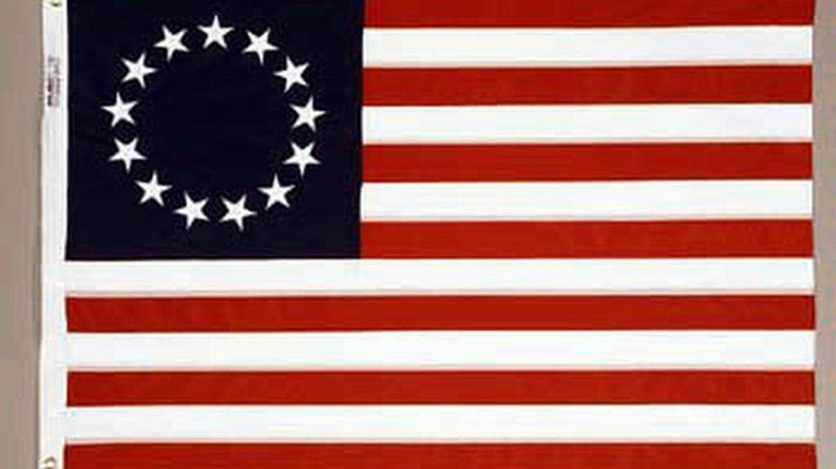 A Betsy Ross-style flag like the one shown here hung on the front door of a Turlock residence and was burned by vandals.