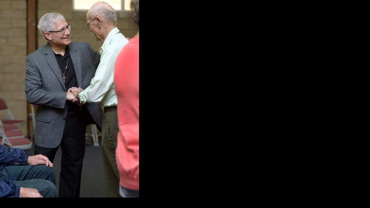 
The congregation of Good Shepherd Lutheran Church in Turlock celebrated pastor Ron Youngdale’s 30 years of service at the church Sunday. Youngdale came to Good Shepherd in 1985. Here, Youngdale greets Ernie Conner, right, of Atwater.
