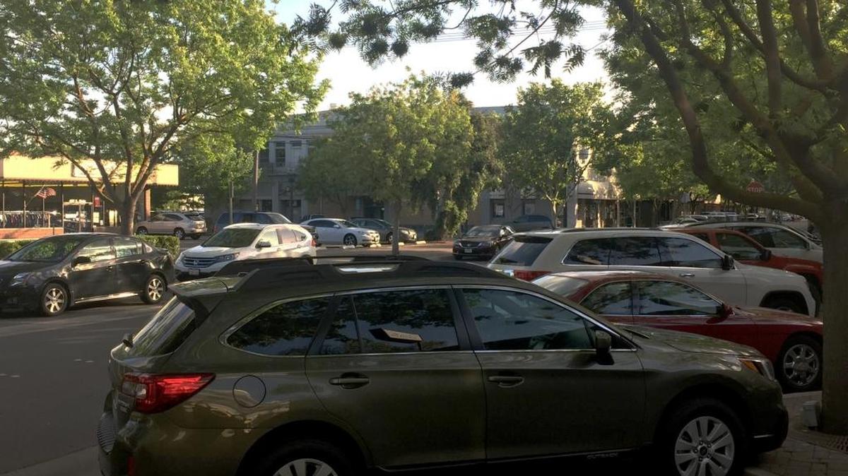 Customers fill parking spaces along East Main Street in downtown Turlock on Thursday, April 14, 2016. The city is taking an online survey and will hold a community meeting May 9 as part of a long-term plan to improve parking downtown.