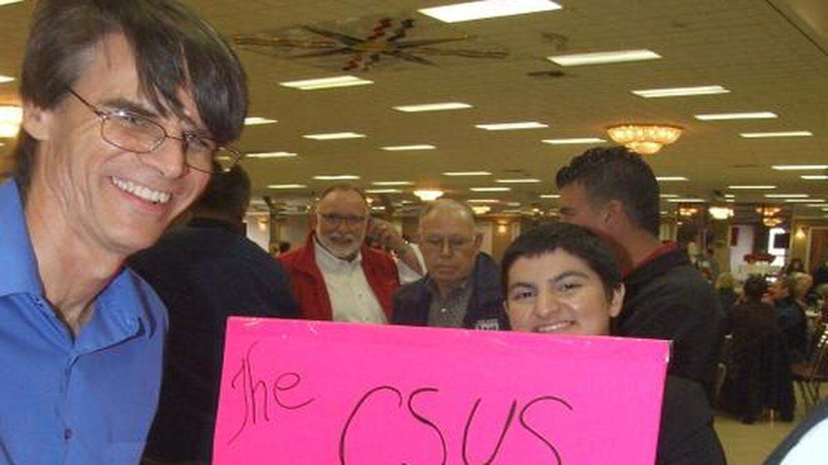 
Brett Forray and Eilanra Abdesho Kavsi were part of the team from California State University, Stanislaus, at the Kettle Kickoff Luncheon for the Salvation Army in Turlock, Calif., on Tuesday, Nov. 18, 2014. Teams had five minutes to dash around the crowd for donations.
