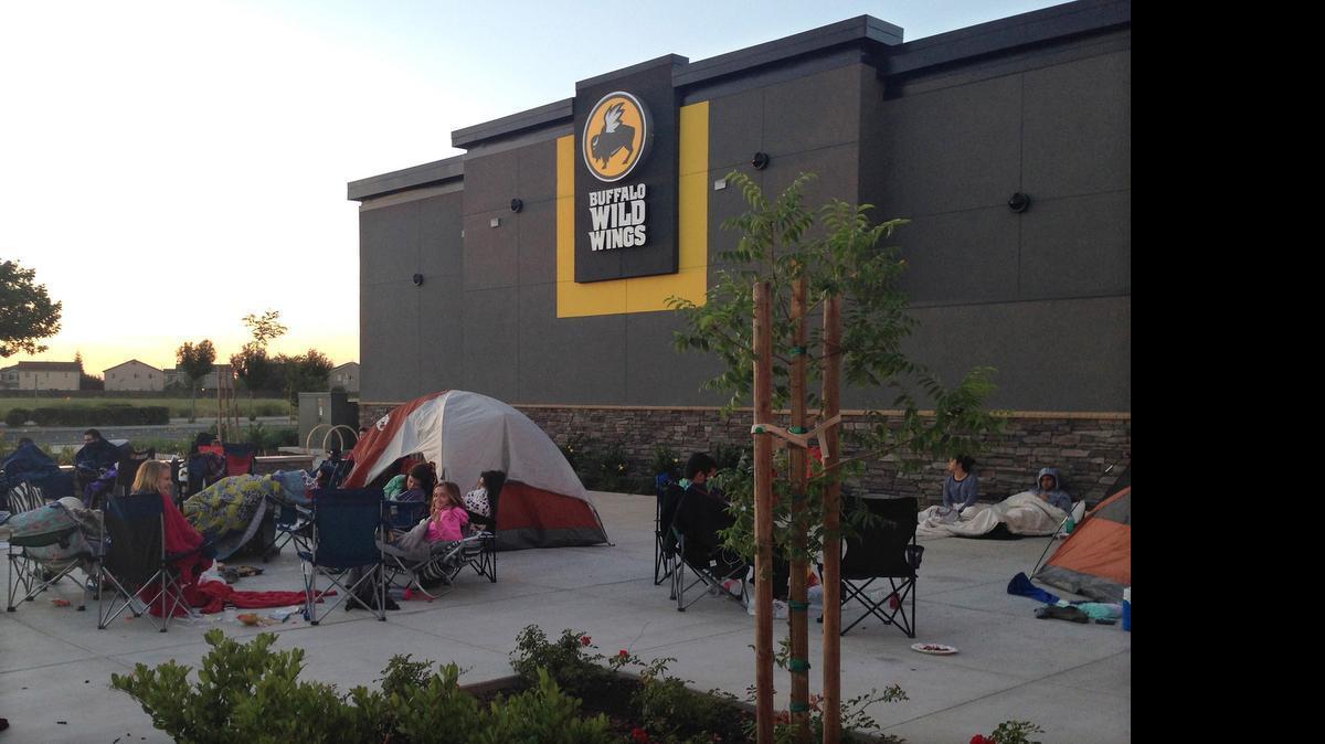 
Buffalo Wild Wings opened in Turlock on Monday, and there were quite a few folks waiting in line for the grand opening. The first 100 people in line got free wings for a year.
