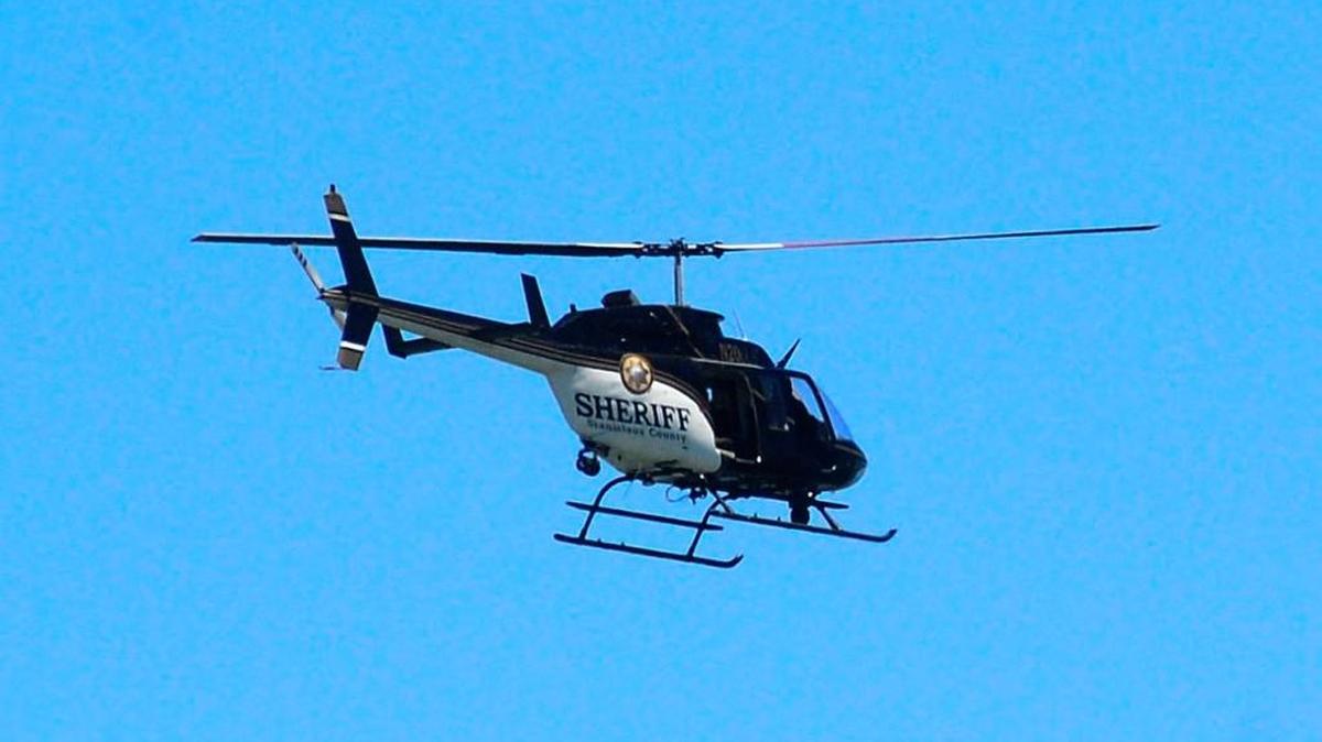 A Stanislaus County sheriff’s helicopter conducts a search-and-rescue at Modesto Reservoir in June 2017.