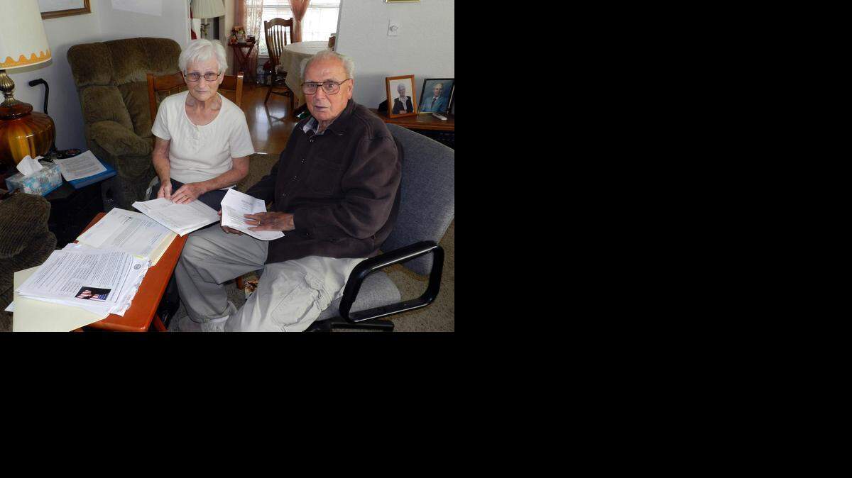 
Veteran Bobby Burnett and wife Joyce Burnett are pictured Tuesday  at their home near Knights Ferry,  looking over paperwork on his VA benefits. Burnett was required to return $16,000 in what the VA said was overpaid benefits.
