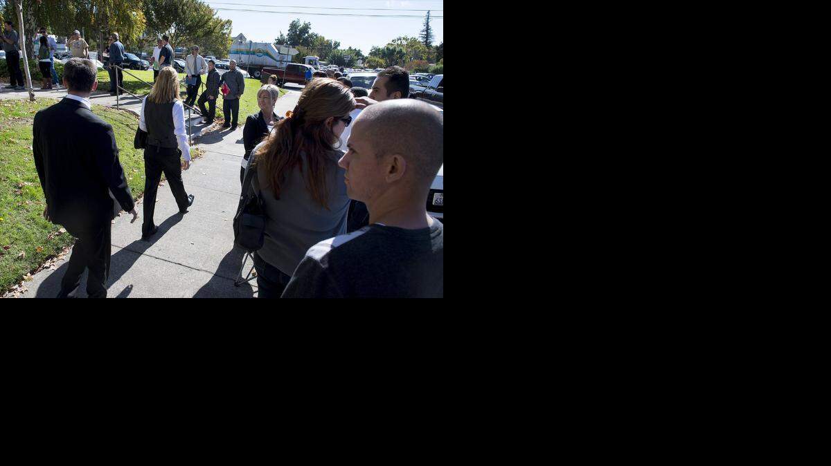
People lined up for the chance for a job during a Hilmar Cheese hiring event at the War Memorial Building in Turlock, Calif., on Tuesday, Oct. 28, 2014.
