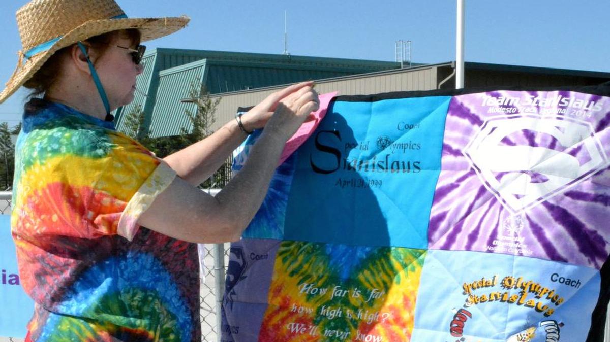 
Nikki Larsen, mother of a longtime participant, created a quilt of past Special Olympics T-shirts as a fundraiser for the event, held in south Modesto on Saturday.
