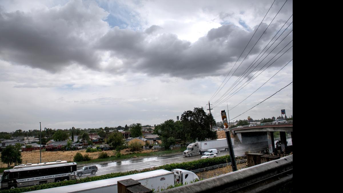 
A storm system drops a light amount of precipitation on Highway 99 in Ceres on Thursday.
