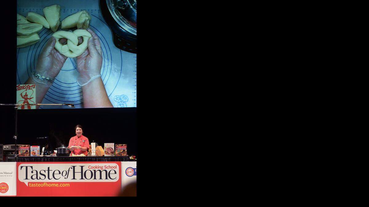 
Culinary specialist Kristi Larson makes soft beer pretzels at the Taste of Home Cooking School at the Gallo Center for the Arts, Tuesday, Oct. 21, 2014.
