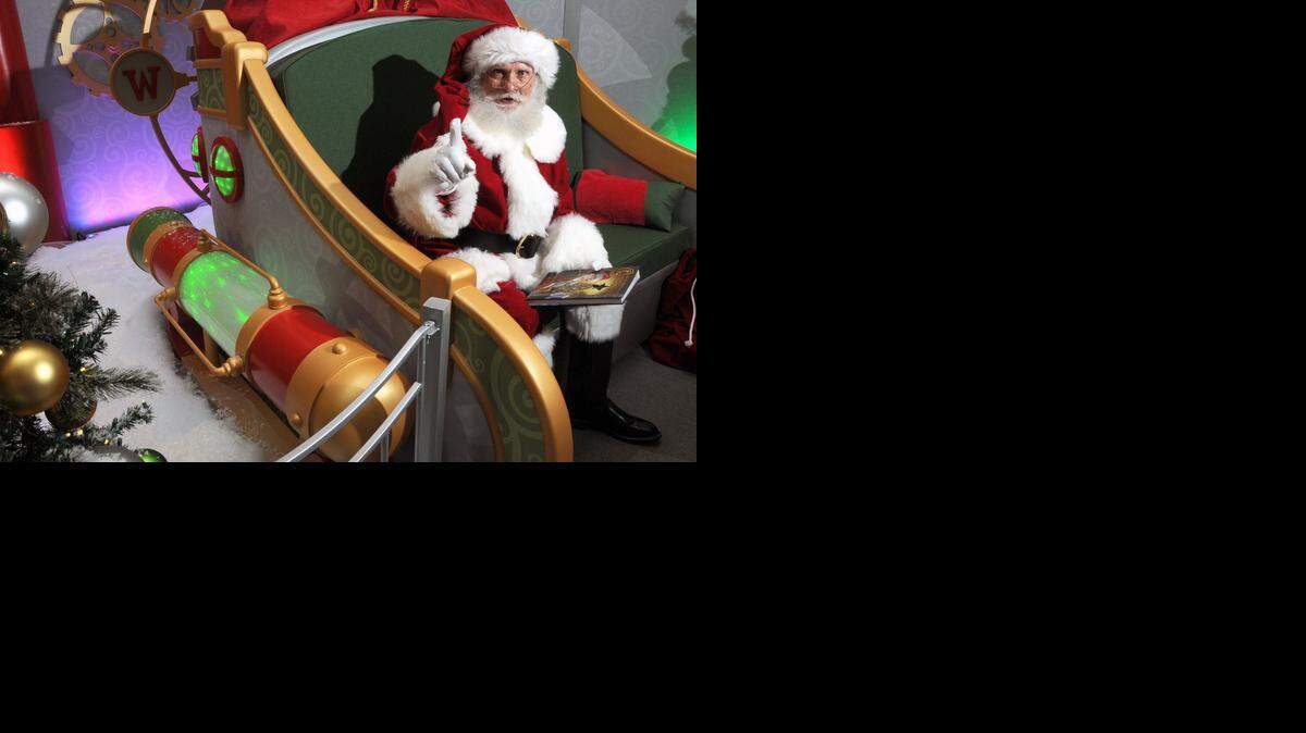 
Santa Claus is pictured in his sleigh at Santa HQ on Wednesday morning (11-05-14) at Vintage Faire Mall in Modesto, CA.
