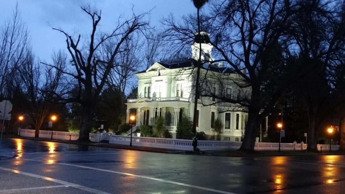 A light rain falls on downtown Modesto on Tuesday morning.