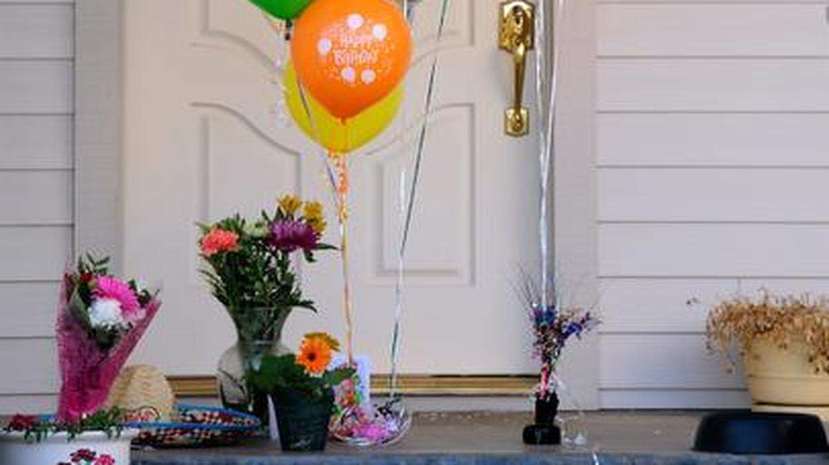 
A memorial for the four killed in a murder-suicide is seen Monday morning  on Sharilyn Drive in Modesto.

