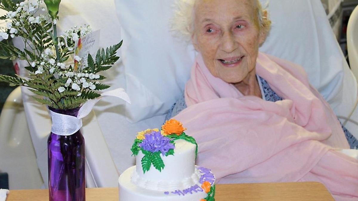 Doris Johnson, a retired nurse, celebrates her 104th birthday Friday in Modesto at Doctors Medical Center. In good spirits and surrounded by her nurses and her niece, her care team sand “Happy Birthday” and presented her with a cake and flowers.