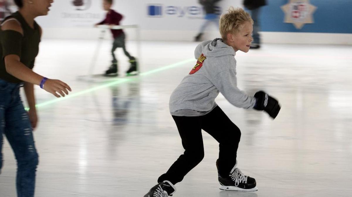 Spencer Mortensen, 11, of Modesto, skates during opening day of Modesto On Ice in Downtown Modesto, Calif., on Saturday, Nov. 18, 2017.