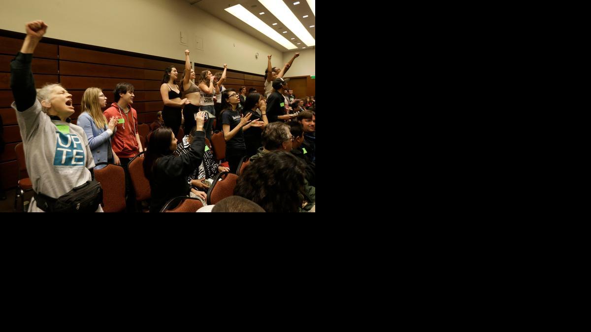 University of California students and supporters yell during a UC Board of Regents meeting in San Francisco on Wednesday.
