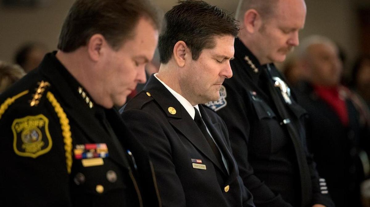 From left, Stanislaus County Sheriff Adam Christianson, Modesto fire Chief Sean Slamon and Modesto police Chief Galen Carroll attend the 12th annual Blue Mass at St. Joseph’s Catholic Church on Saturday, Jan. 10, 2015.