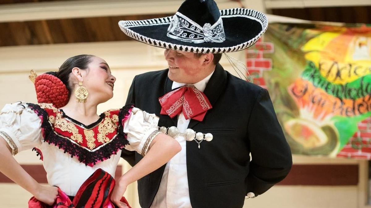 Members of Ballet Folklorico Anahuac Jocelyn Villa, 13, left, and Javier Jaquez, 24, perform during Cesar Chavez Family Day Celebration at Chavez Park in Modesto, Calif., on Saturday, April 7, 2018.