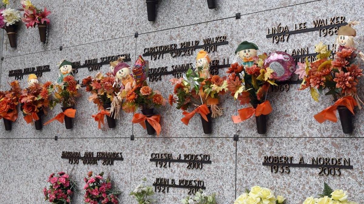Fall decorations are pictured Monday afternoon, Oct. 3, 2016, on crypts at the St. Stanislaus Catholic Cemetery on Scenic Drive in Modesto, Calif.