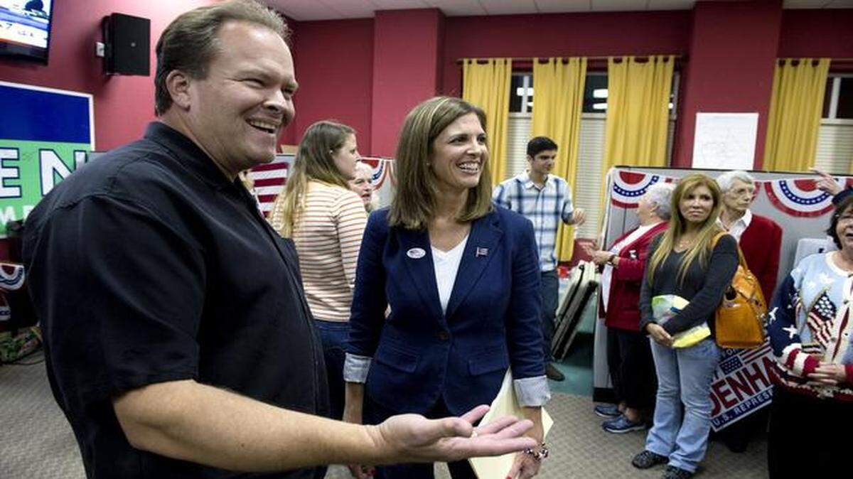 
Kristen Olsen talks with supporters including Stanislaus County Sheriff Adam Christianson, left, at a gathering for her campaign and Republican Rep. Jeff Denham, R-Turlock, in Modesto on Tuesday, November 4, 2014.
