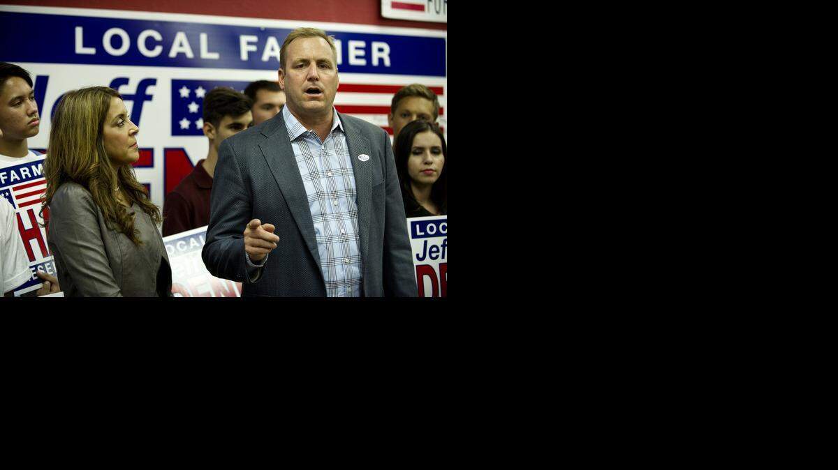 
Rep. Jeff Denham, R-Turlock, speaks to his supporters with his wife, Sonia, at his side Tuesday night in Modesto.
