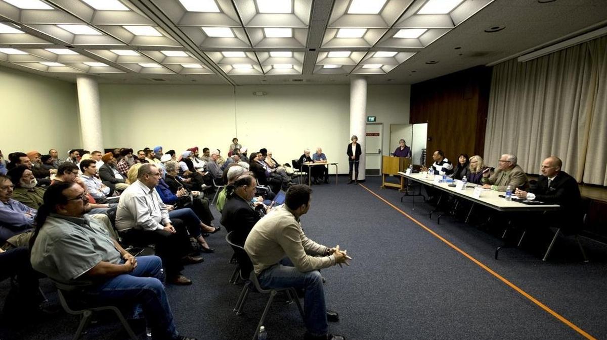 A crowd filled the basement of the Stanislaus County Library for a District 12 state Assembly candidate debate in Modesto on Wednesday, March 30, 2016.
