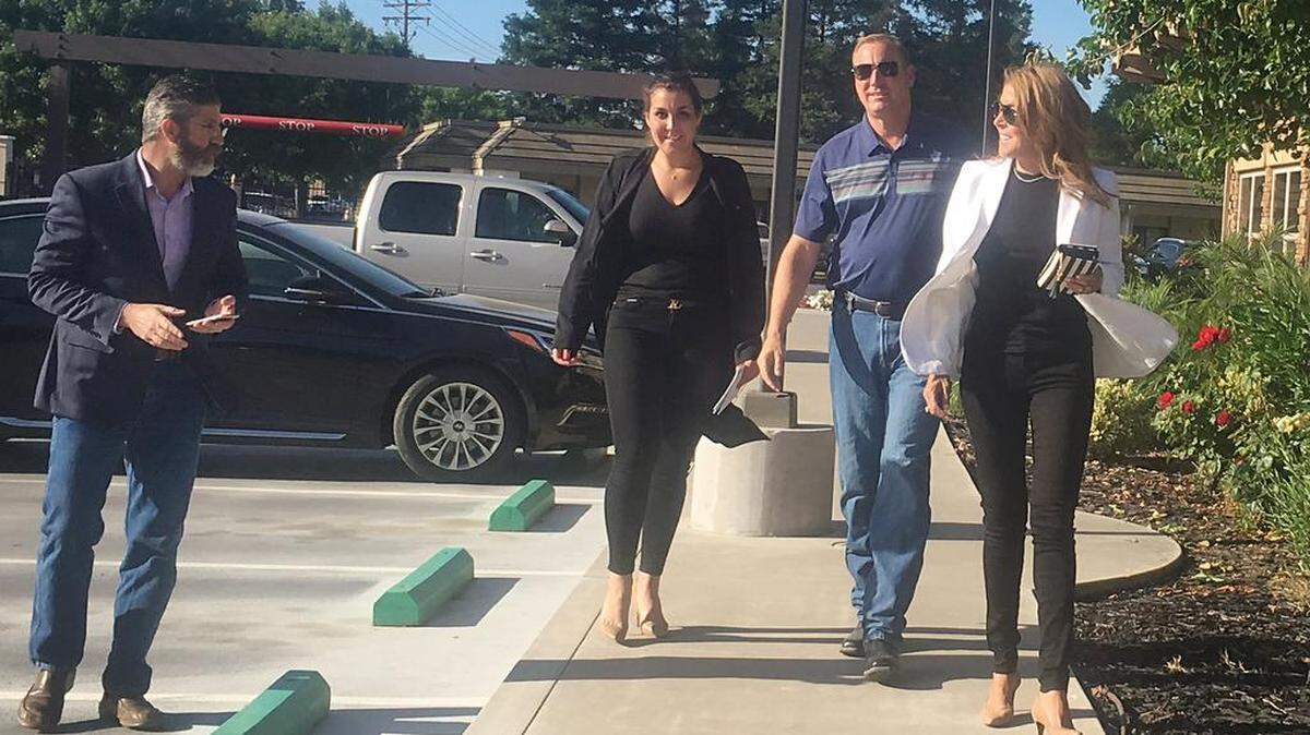 U.S. Representative Jeff Denham arrives at his polling place with his wife Sonia in Turlock.