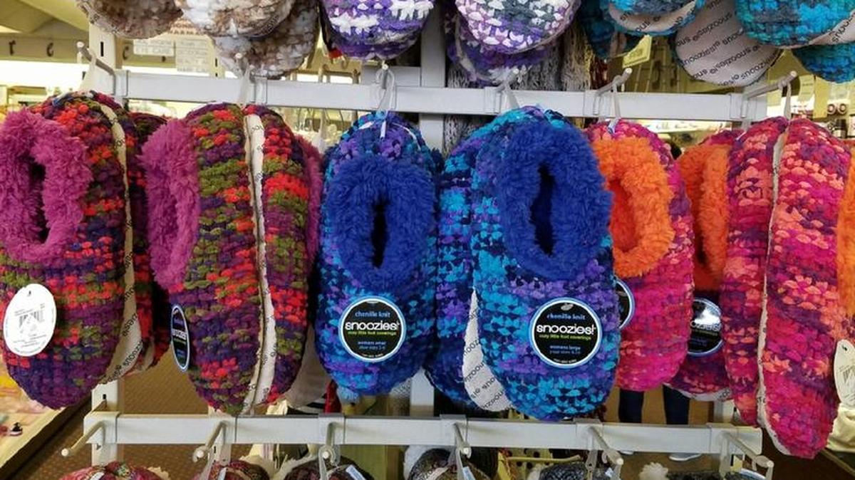 Snoozies brand slippers provide the gift of warmth.