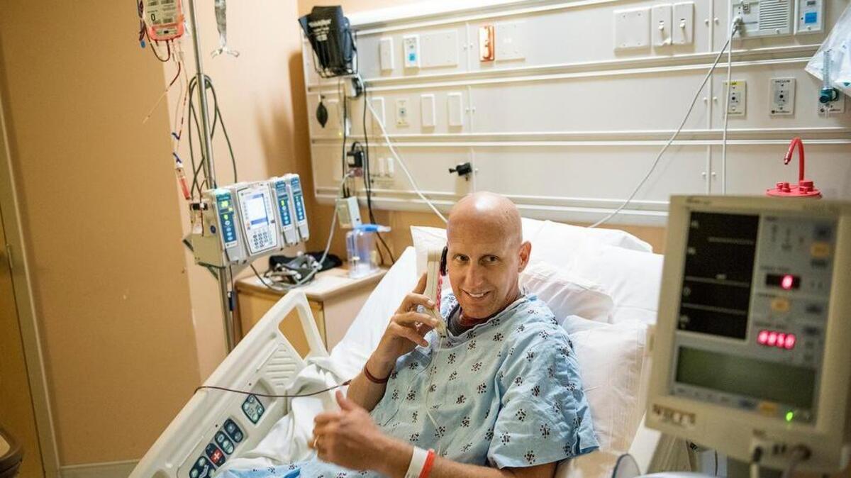 Kevin Wise calls the nurse from his hospital bed at Kaiser Hospital in Modesto on Friday, Dec. 4, 2015. Wise, a Stanislaus Consolidated Fire Protection District battalion chief, has been diagnosed with leukemia and will be getting a bone marrow transplant.