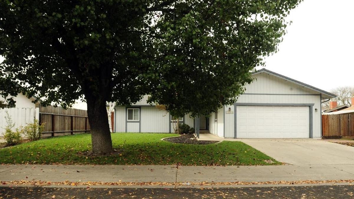 This East Orangeburg Avenue home in Modesto, seen Sunday, was involved in what authorities say was a scheme to take advantage of homeowners facing foreclosure.