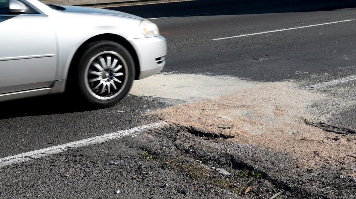 A large pothole was repaired on Highway 99 just south of Tuolumne Boulevard after drivers were disabled with flat tires in Modesto on Tuesday, Dec. 15, 2015.
