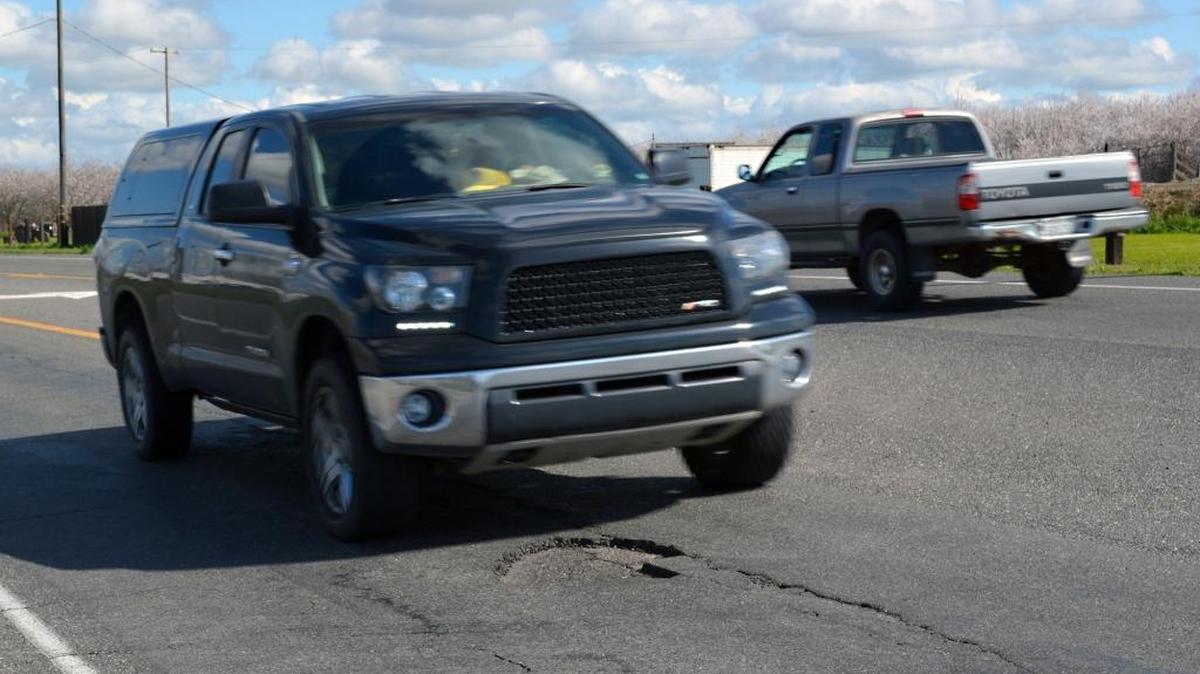 A pothole developed recently on Albers Road, south of Oakdale and south of Patterson Road. Twice the area’s normal rainfall and less maintenance money is causing the roads to deteriorate at a rapid pace.