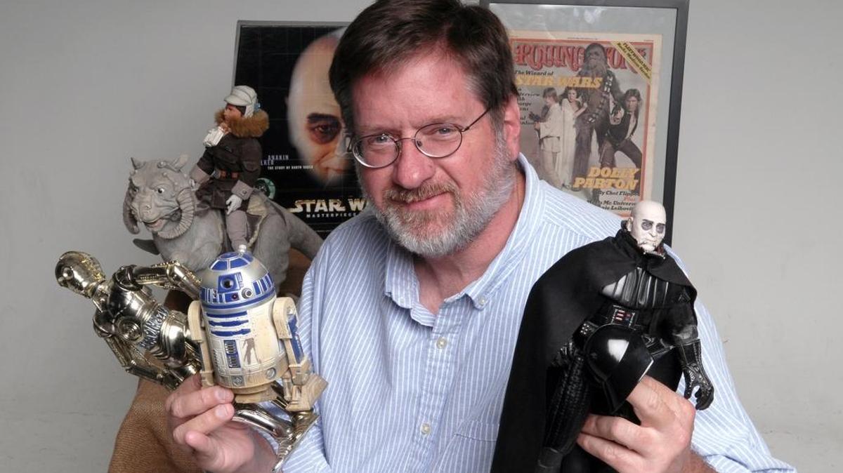 Modesto Bee staff writer Deke Farrow is pictured Thursday afternoon, Nov. 5, 2015, in the Modesto Bee photo studio with his Star Wars memorabilia.