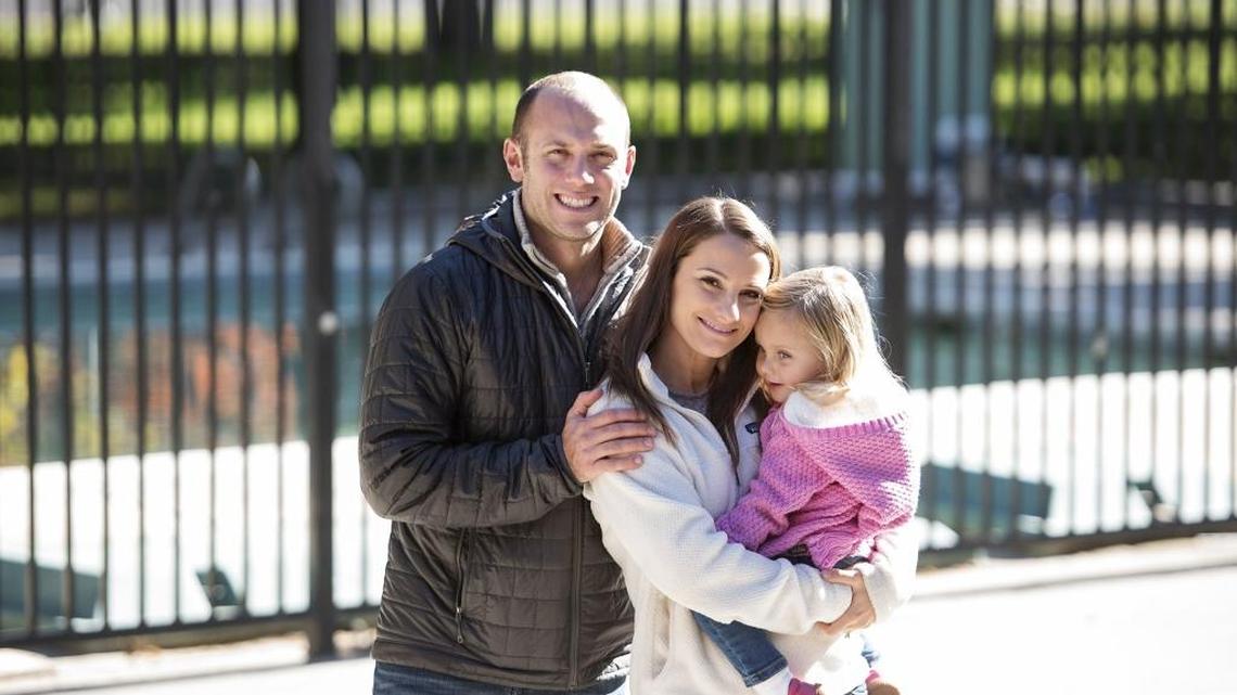 Jake and Katie Barber spend time with their daughter, Brooke, at the children’s pool at Graceada Park in Modesto on Saturday.
