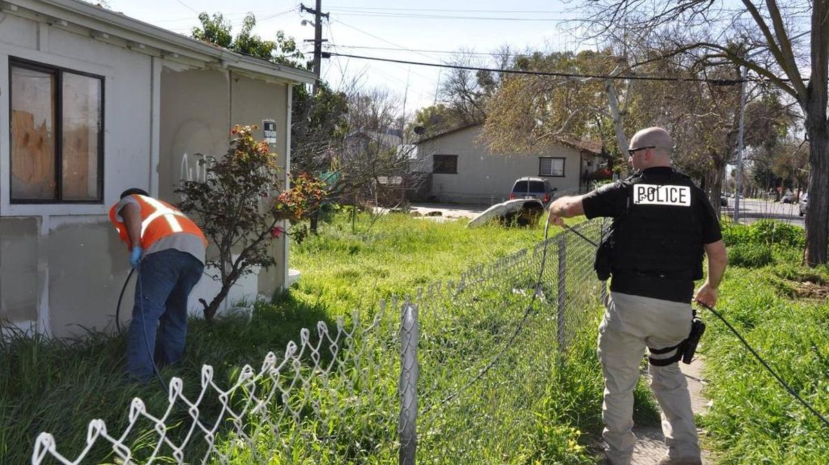 The Modesto Police Department Street Gang Unit took part in a collaborative graffiti cleanup in the south area of the city Monday along with city crews and volunteers with Advancing Vibrant Communities.