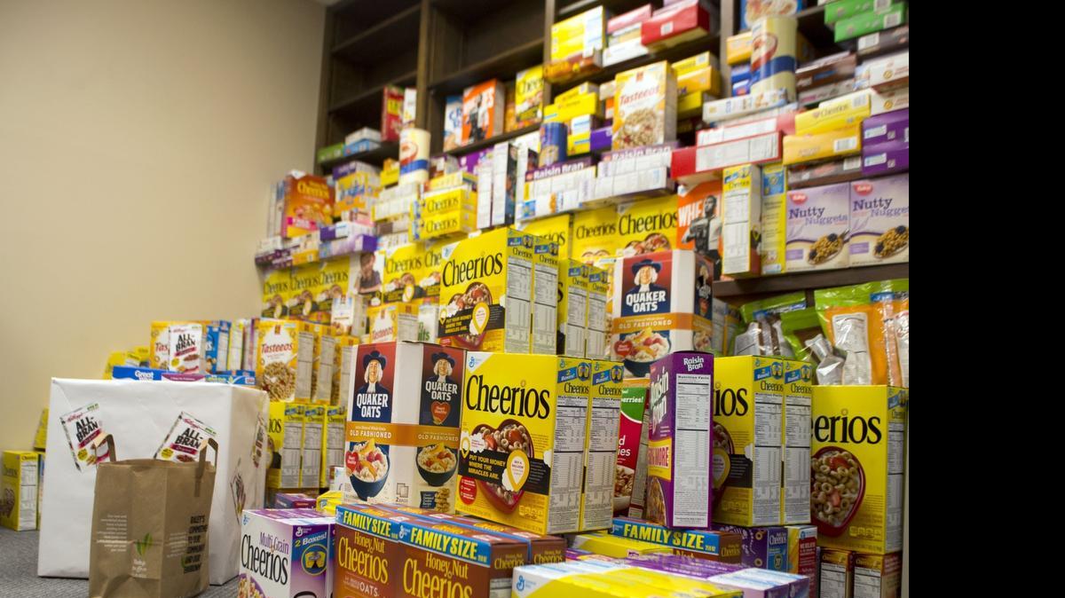 
Collected cereal is seen Wednesday at Emanuel Medical Center in Turlock. It will be donated later to the New Life Christian Center food bank.
