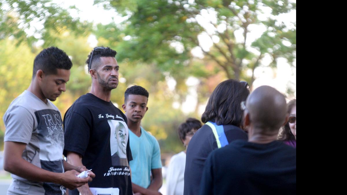 
Alex Mandall speaks to those gathered Sunday at Beyer Park.

