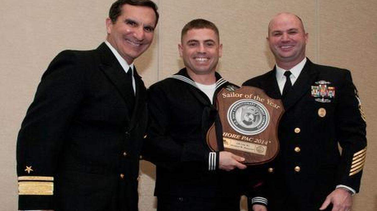 
Steelworker 1st Class Brenton Heisserer of Modesto, center, has been honored by the Navy Expeditionary Combat Command as its Sea Pacific Shore Sailor of the Year. He is assigned to the Naval Construction Group.
