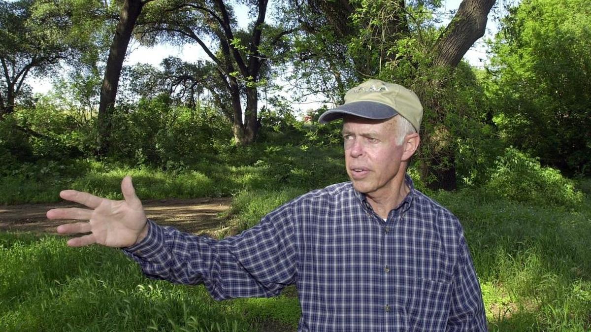 Scott McRitchie of Riverbank points out future sites for picnic areas along the Stanislaus River in Jacob Myers Park on in March 2005. Ted Benson/The Modesto Bee