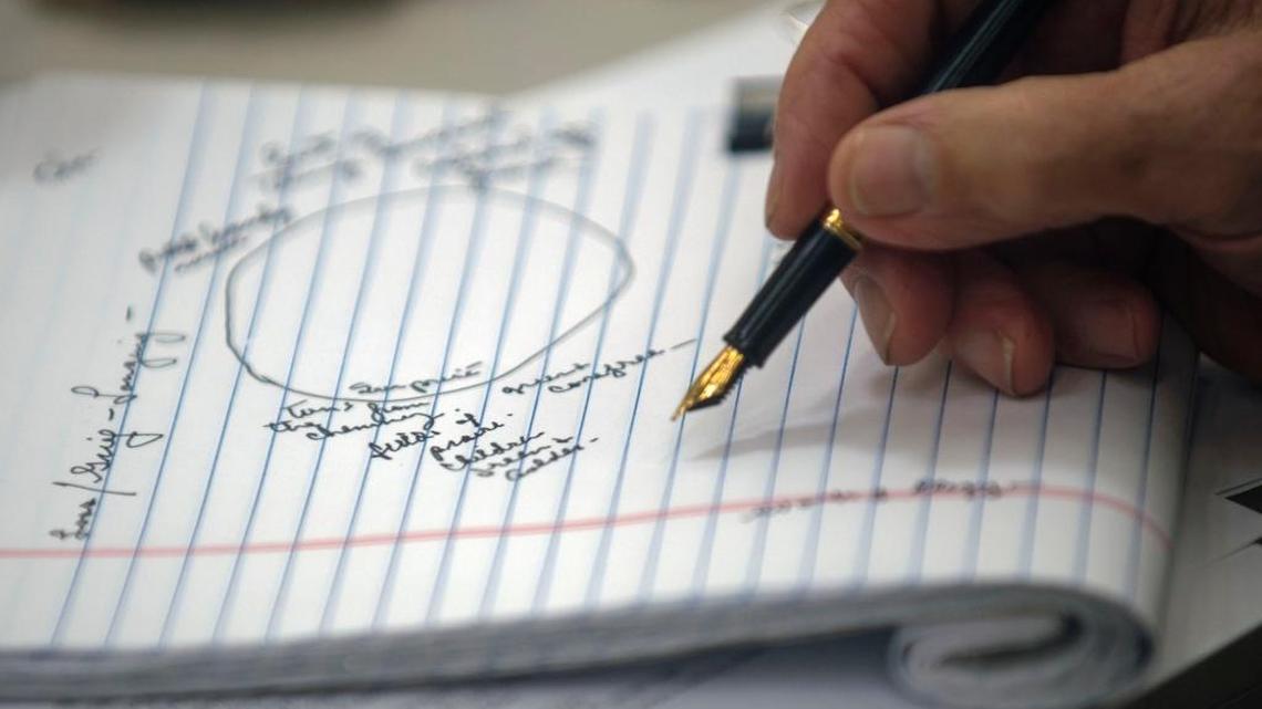 Words gleaned from other poems in a word cloud were considered by one pen-equipped participant in last year’s Modesto Poetry Festival.